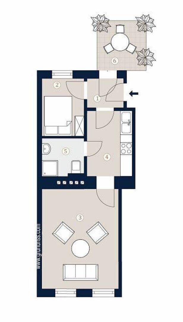 Detaillierter Grundriss einer Wohnung mit Terrasse, Schlafzimmer und offenem Wohnbereich.