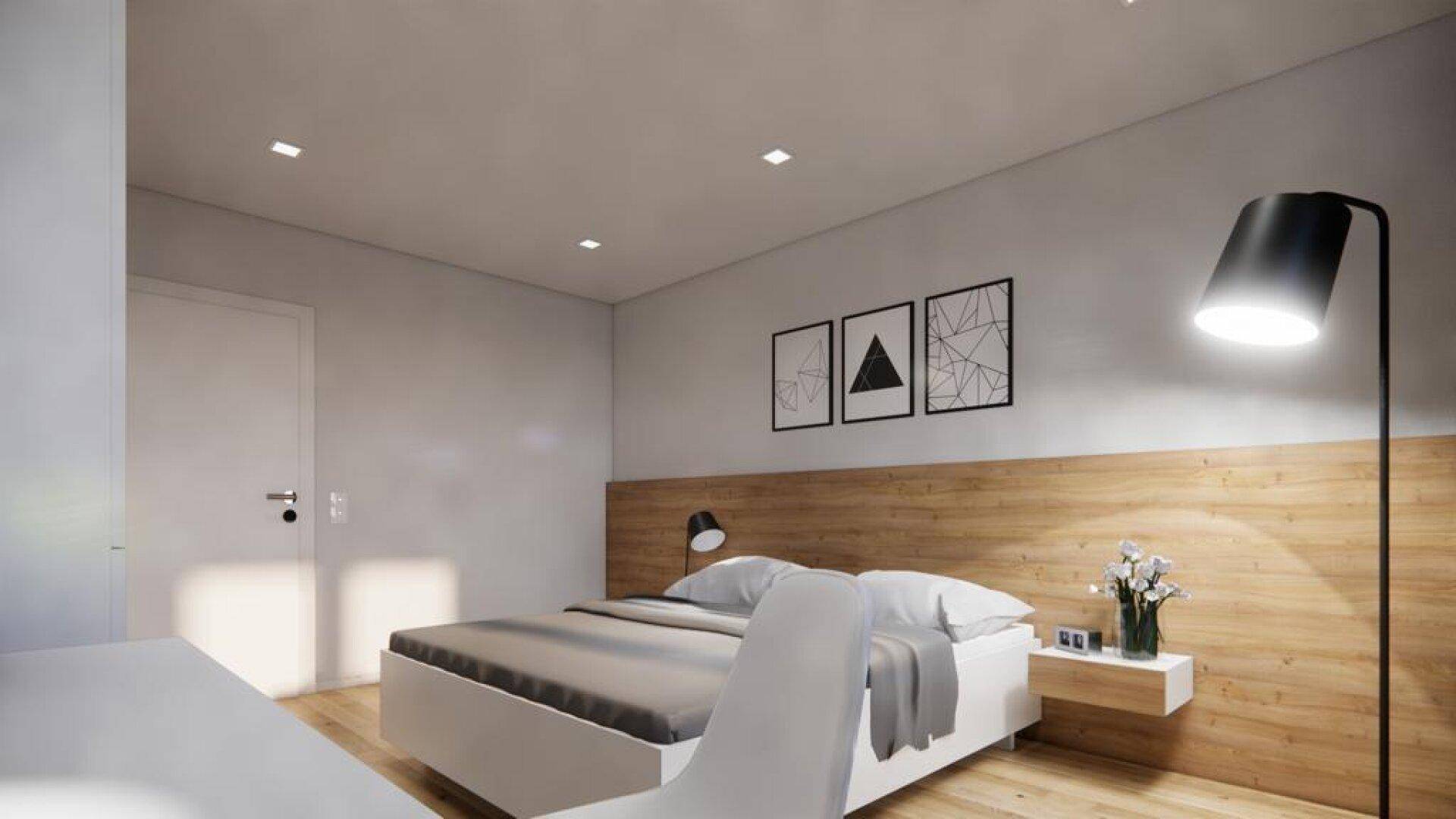 Modernes Schlafzimmer mit Holzakzenten, minimalistischer Einrichtung und viel natürlichem Licht.
