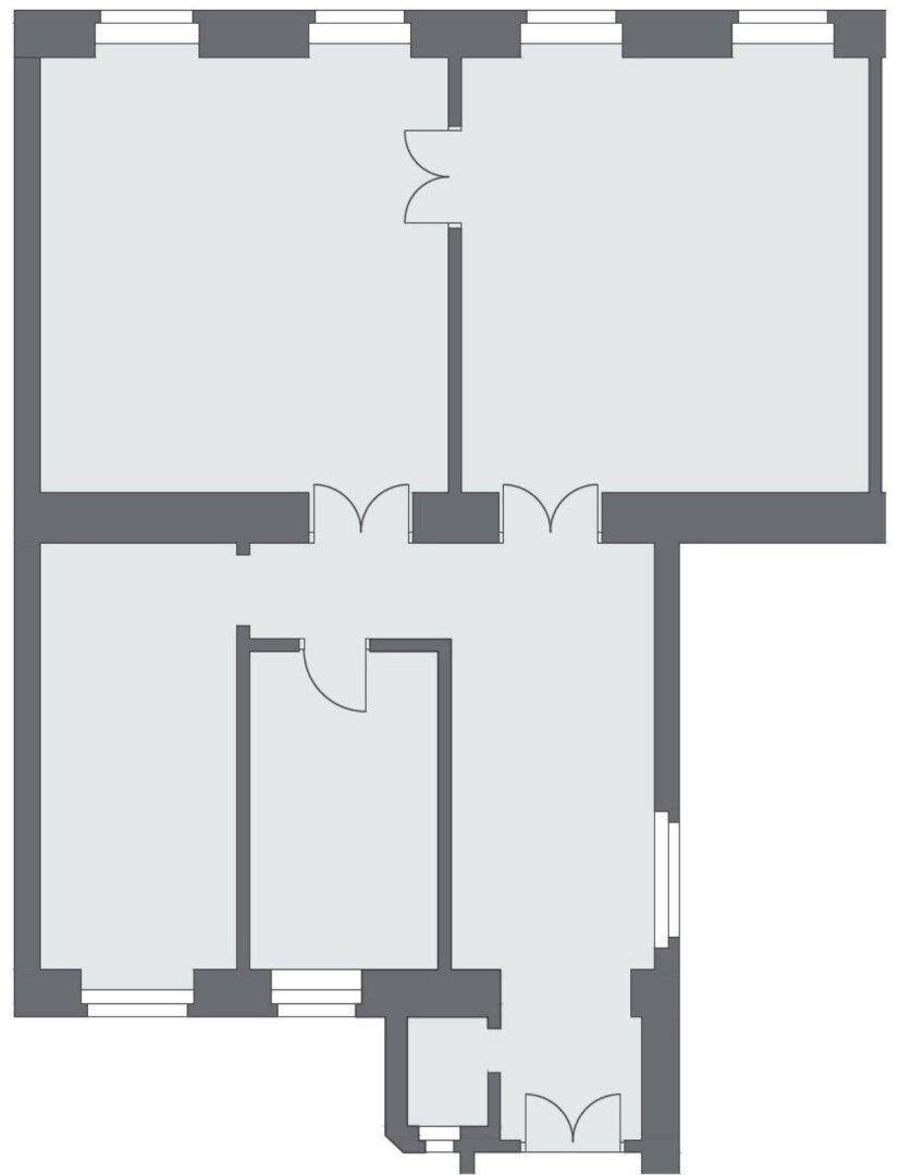 Grundriss einer leeren Wohnung mit drei Zimmern und einem Badezimmer.