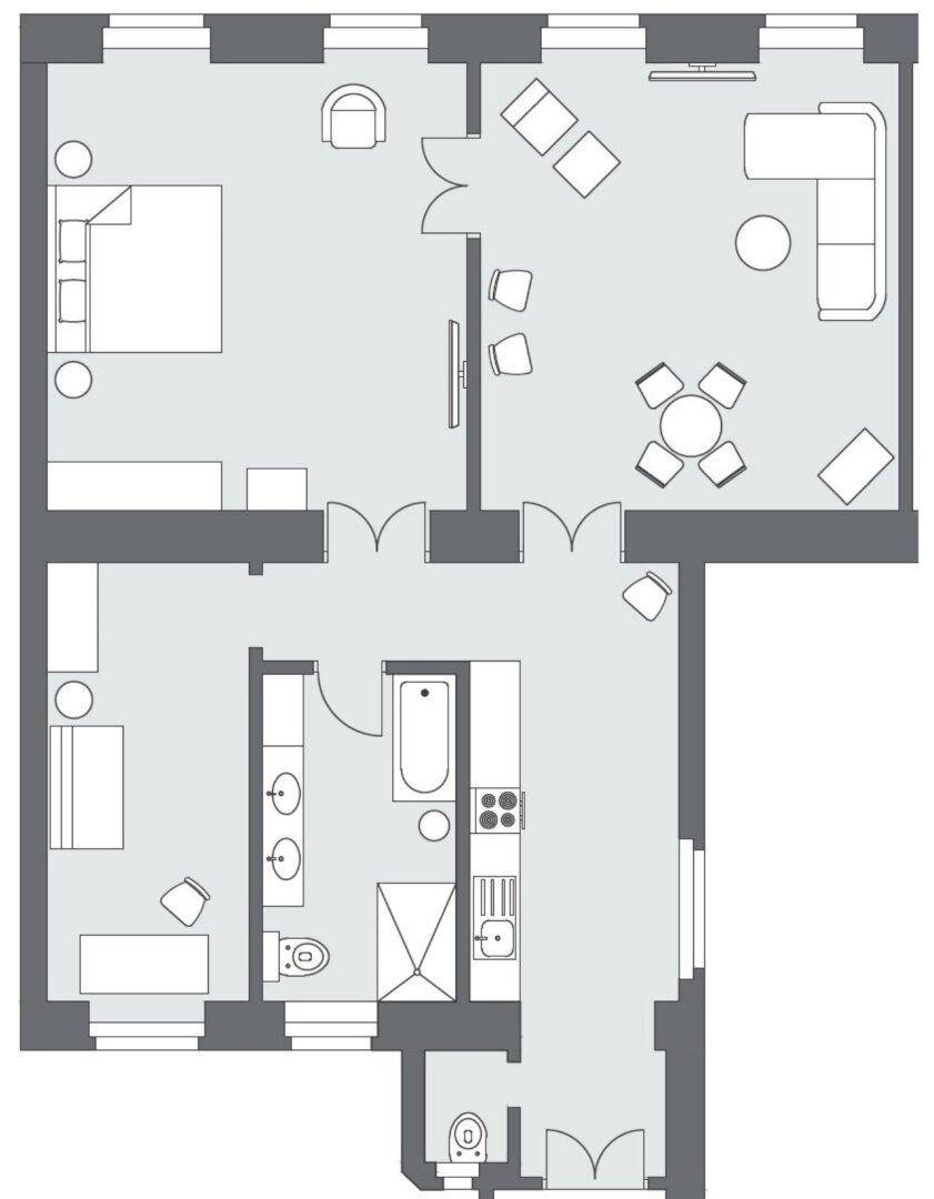Grundriss einer Wohnung mit zwei Schlafzimmern, offenem Wohnbereich und zwei Bädern.