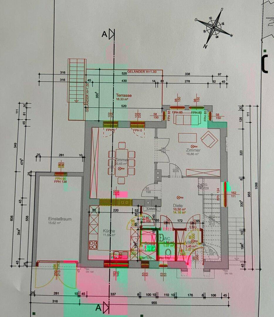 Grundriss des Erdgeschosses mit Küche, Wohn- und Essbereich, einem Zimmer und einer Terrasse.