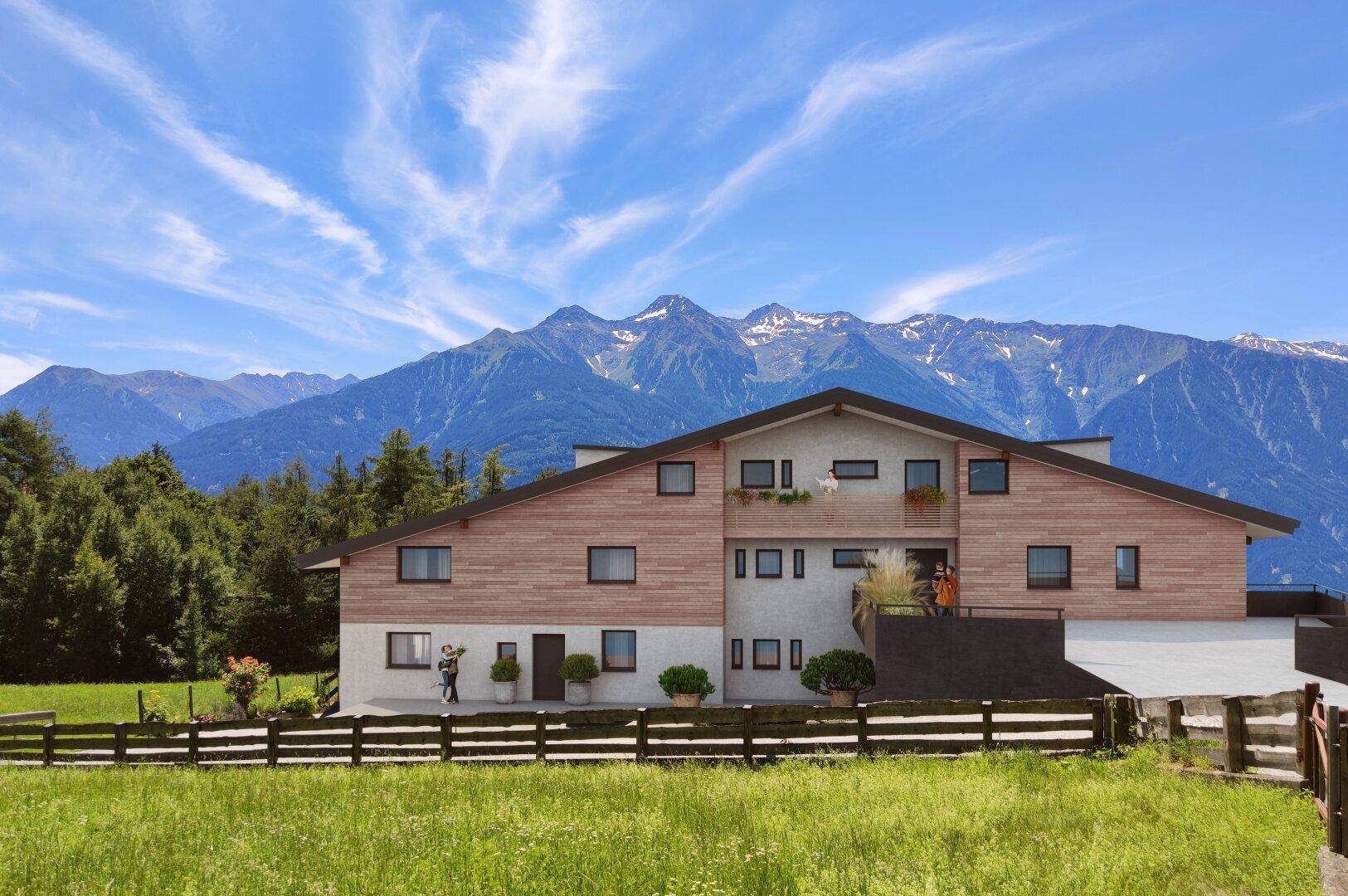 Ansicht eines modernen Gebäudes mit Holzverkleidung und beeindruckendem Alpenpanorama im Hintergrund.