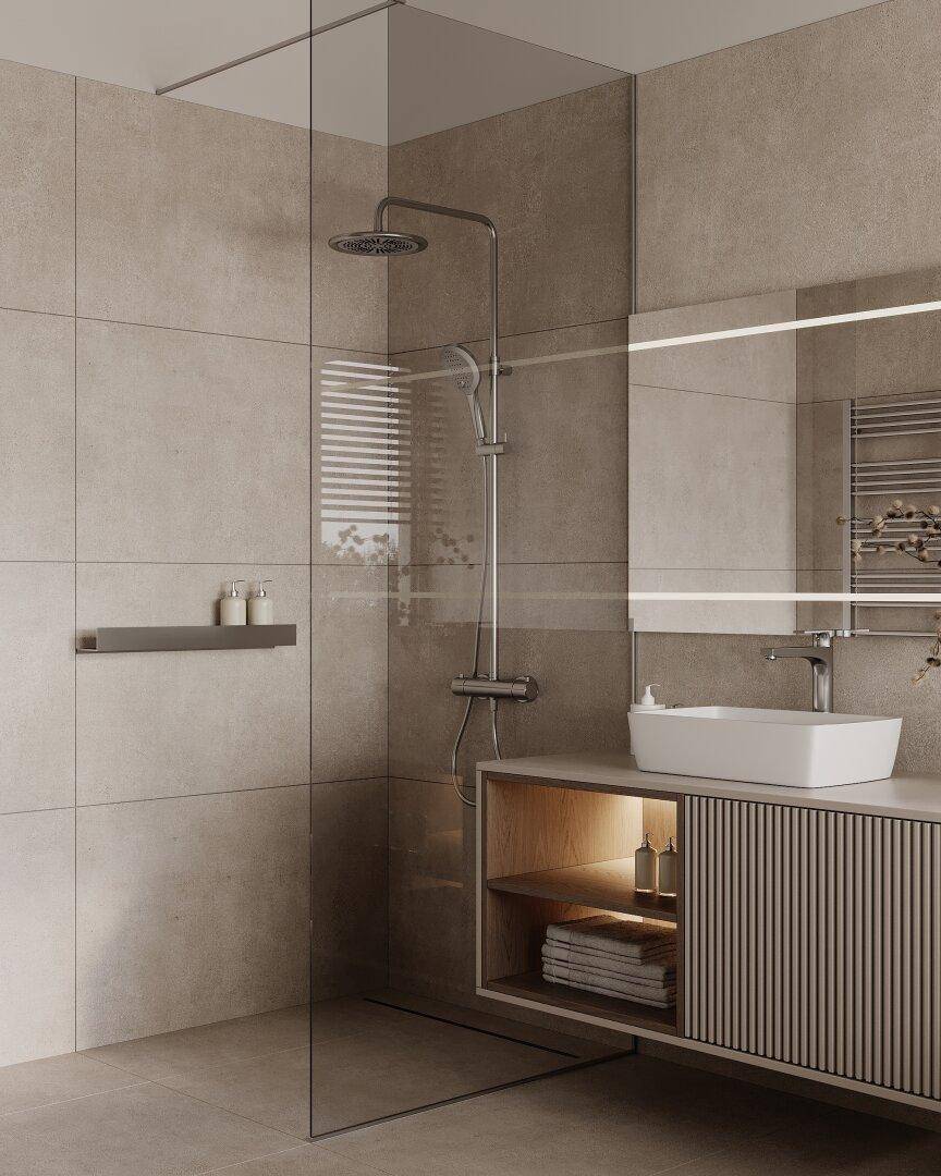 Modernes Badezimmer mit großer begehbarer Dusche, Regendusche und elegantem Waschtisch mit integrierter Beleuchtung.