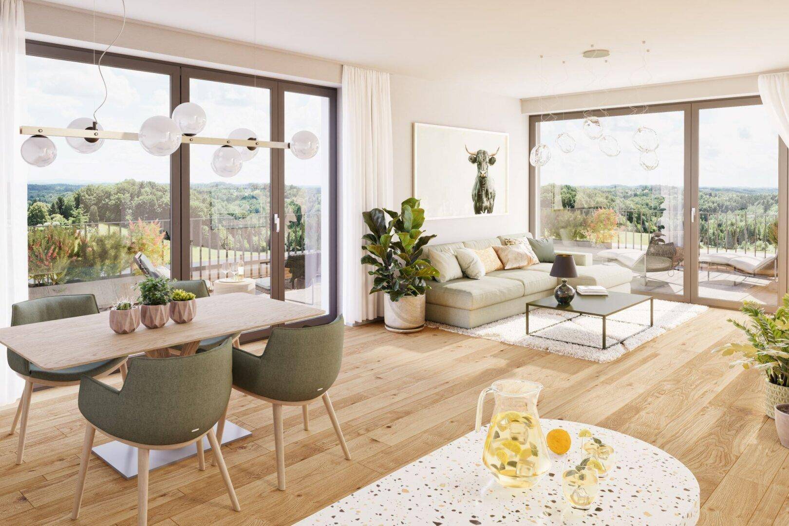 Helles, offenes Wohn-Esszimmer mit Holzboden, großen Fenstern und weitem Ausblick ins Grüne.