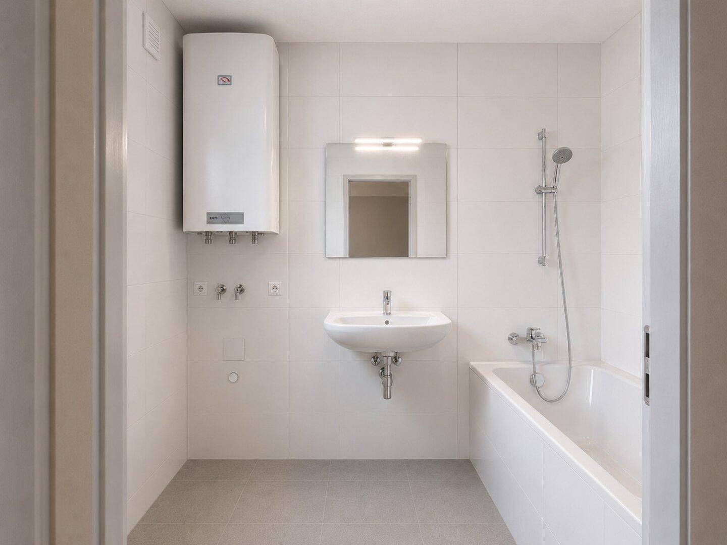 Modernes Badezimmer mit weißen Fliesen, Badewanne und Waschbecken, ausgestattet mit einem Boiler.