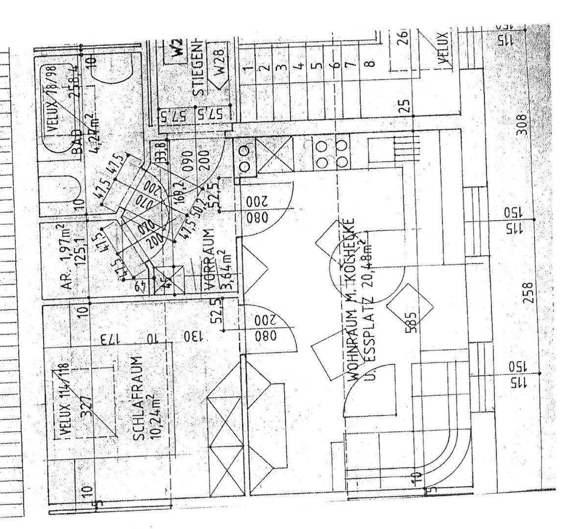 Grundrissplan einer Wohnung mit Wohnraum, Kochecke, Essplatz, Schlafzimmer und Bad.