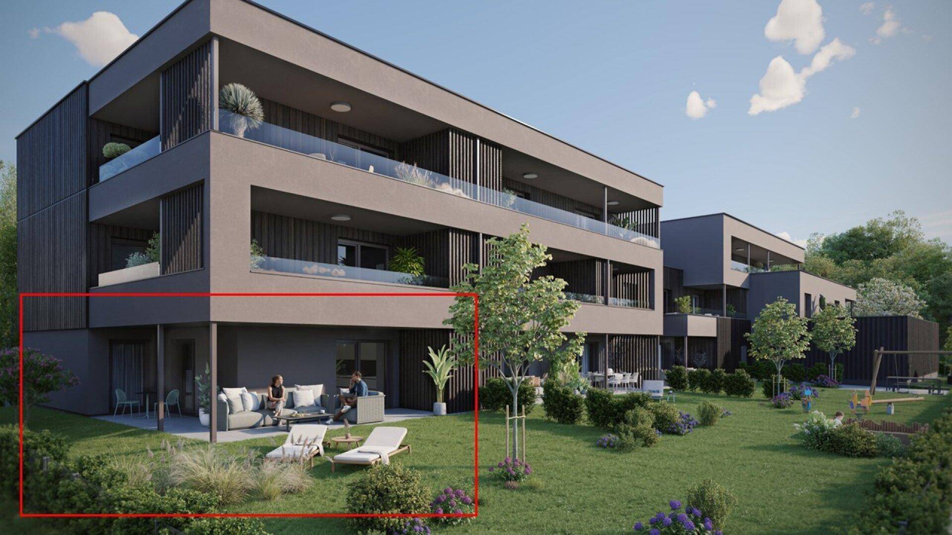 Ansicht der modernen Wohnanlage mit großzügigen Terrassen und Grünflächen im Erdgeschoss.