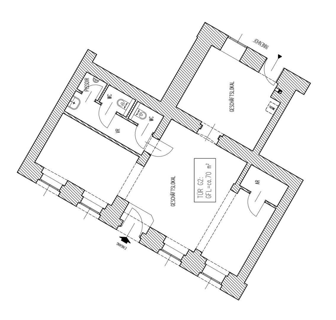 Grundrissplan zeigt zwei Gewerbeeinheiten mit Toiletten und Zugang zum Innenhof und zur Straße.
