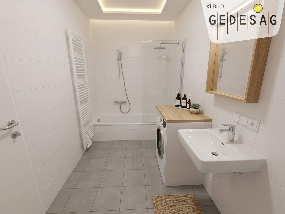 Modernes Badezimmer mit Badewanne, Dusche, Waschbecken und Waschmaschine.