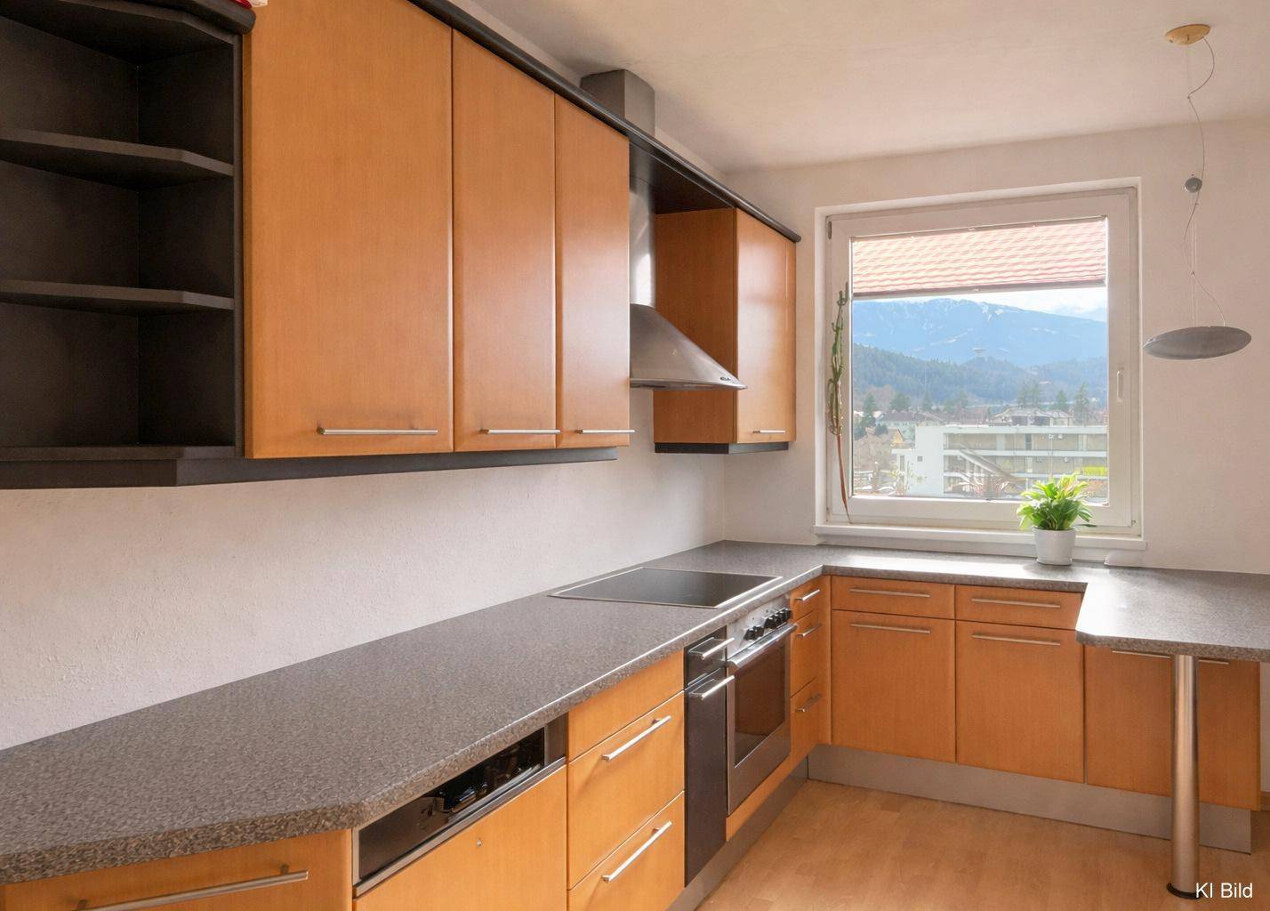 Funktionale Küche mit Holzfronten, Einbaugeräten und einem Fenster mit Bergblick.