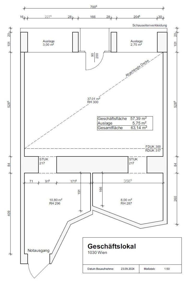 Grundriss eines Geschäftslokals in Wien mit Flächenangaben und Notausgang.