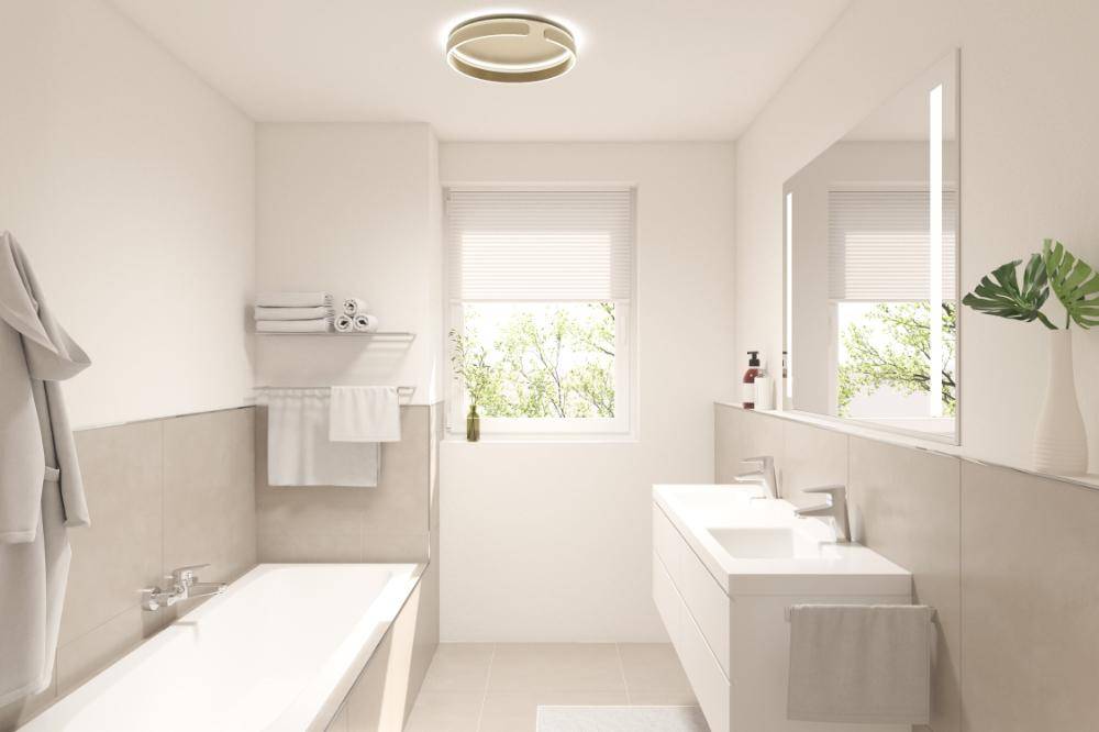 Modernes Badezimmer mit Badewanne, Doppelwaschbecken und Fenster für natürliches Licht.