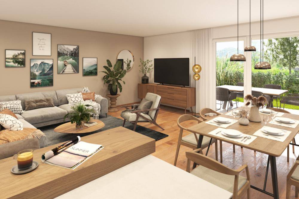 Heller, offener Wohn-Essbereich mit Holzboden, modernen Möbeln und Zugang zur Terrasse.