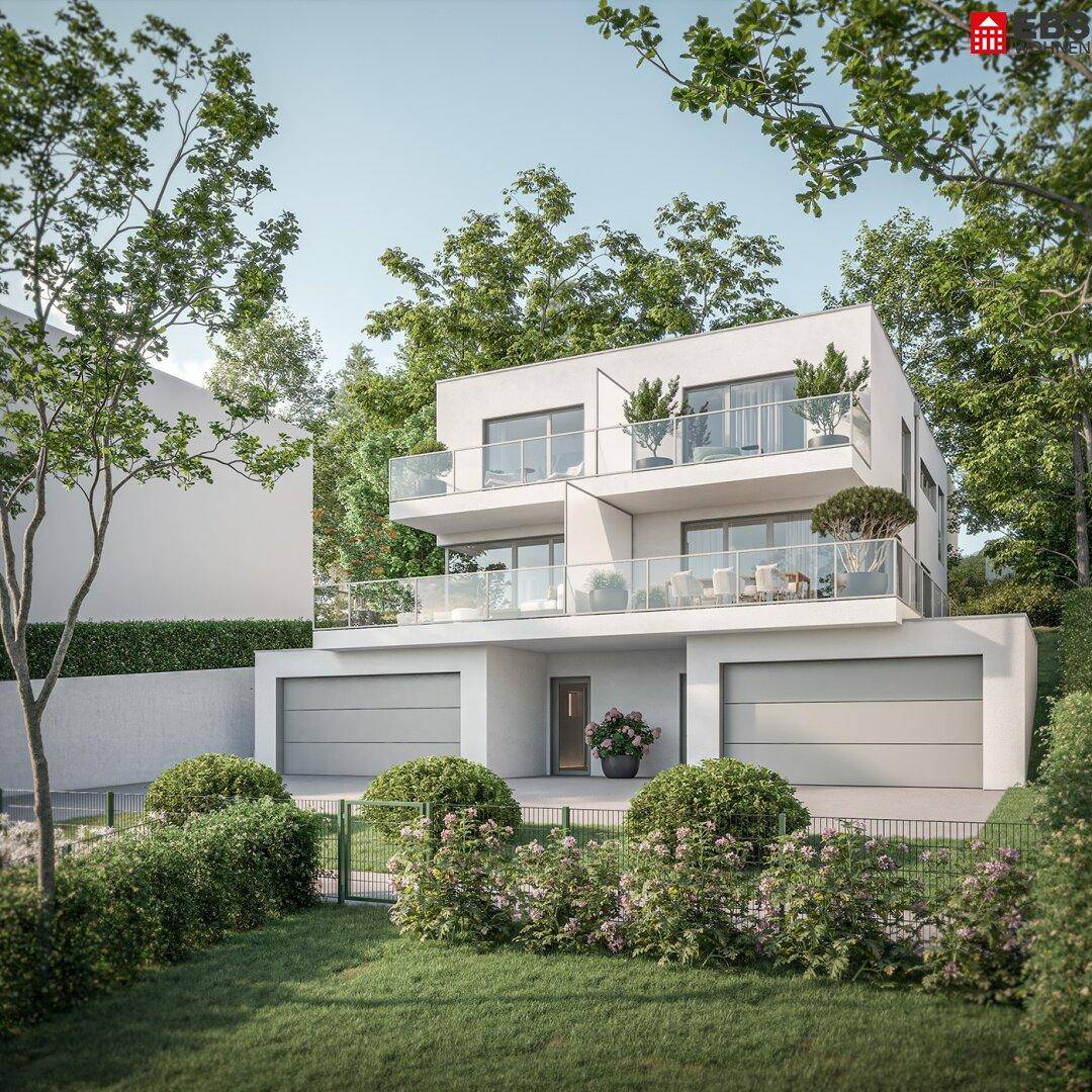 Moderne Doppelhaushälfte mit gepflegtem Vorgarten und Garagenzufahrt.