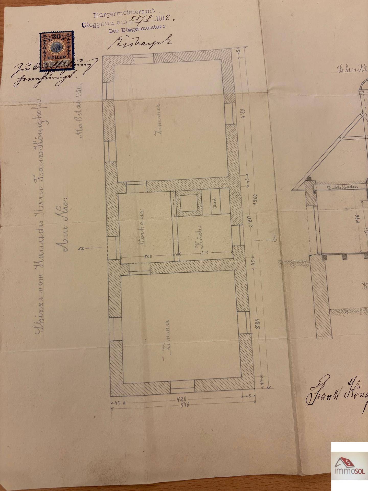 Historischer Grundrissplan eines Hauses mit Zimmern, Küche und Vorhaus aus dem Jahr 1912.