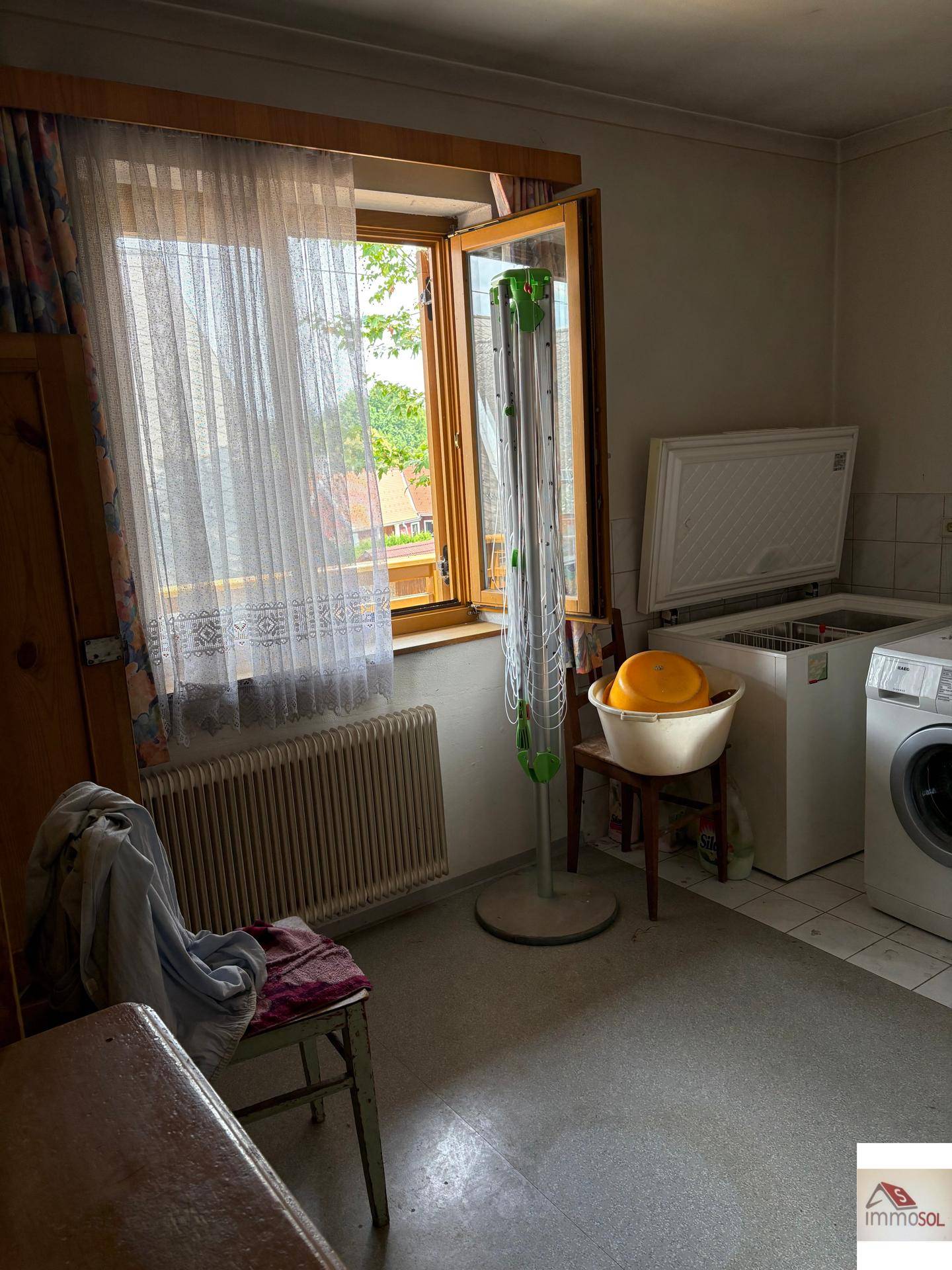 Wirtschaftsraum, Waschmaschine, und Toilettenzugang