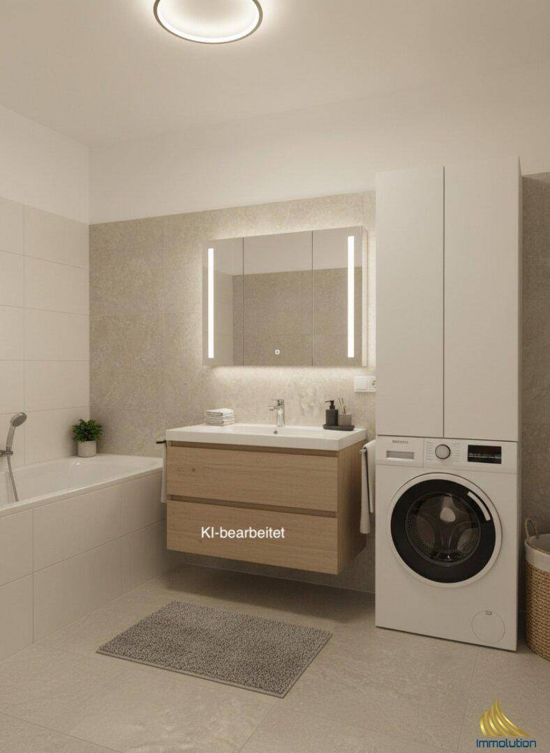 Modernes Badezimmer mit Badewanne, Waschbeckenunterschrank und integrierter Waschmaschine.