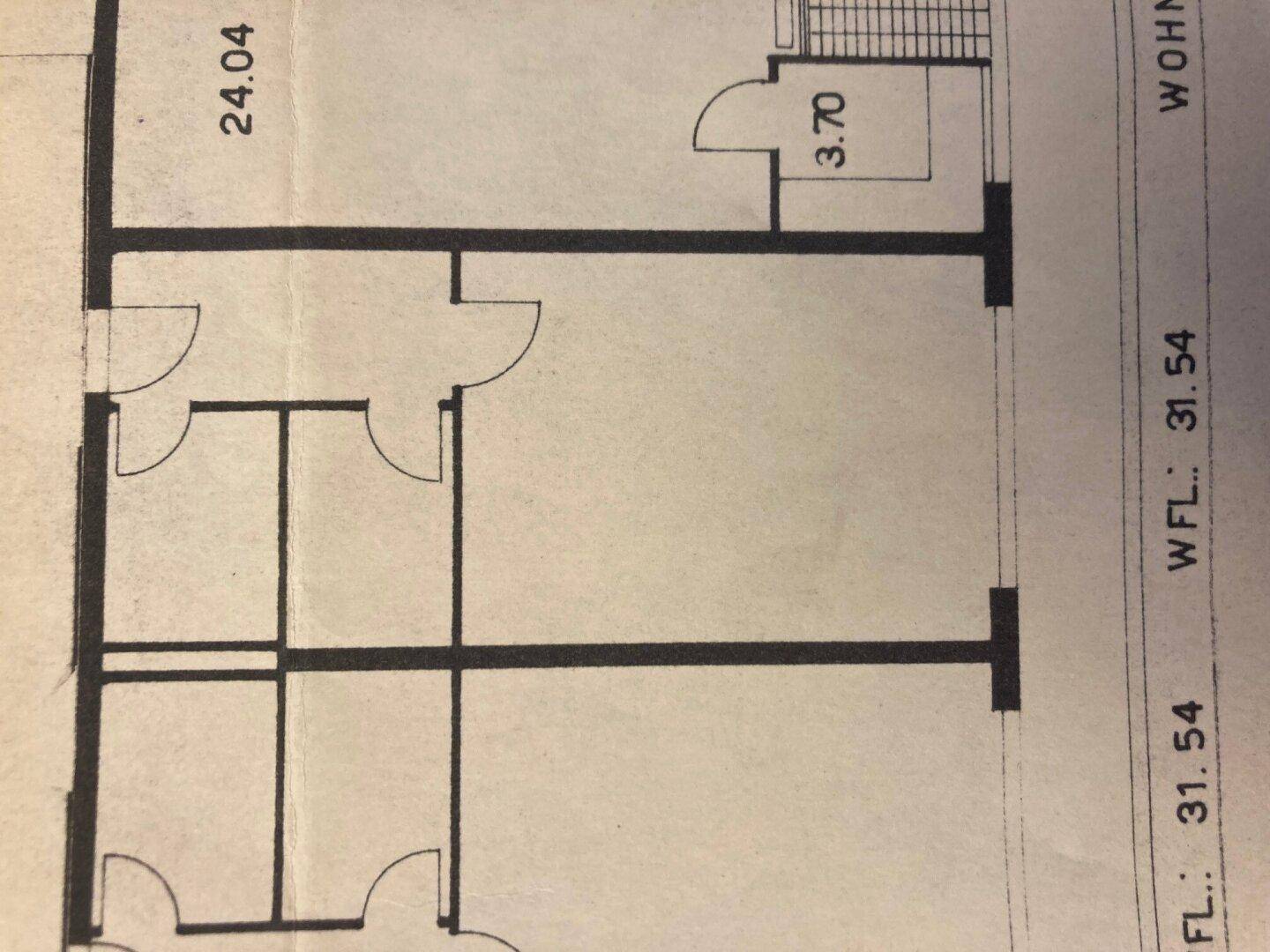 Grundrissplan mit Raumaufteilung und Treppenhauszugang.
