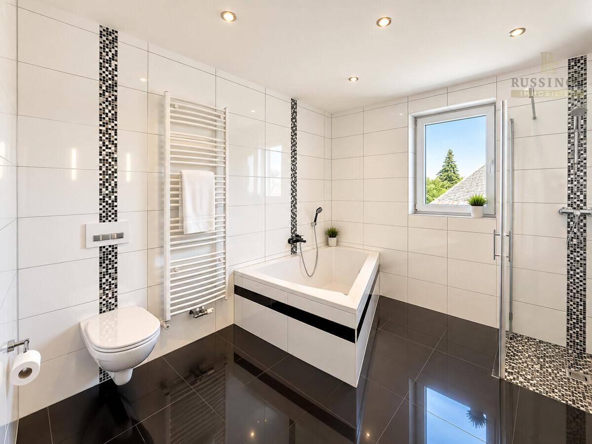 Stilvolles Badezimmer mit Eckbadewanne, wandhängendem WC, Dusche und beheiztem Handtuchhalter.