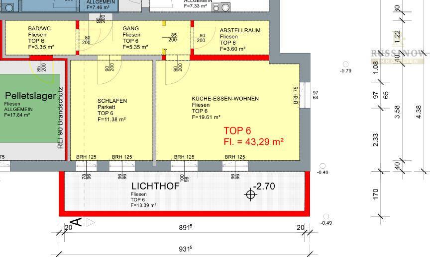 Grundriss von TOP 6 mit offenem Wohnbereich, Schlafzimmer und Lichthof.