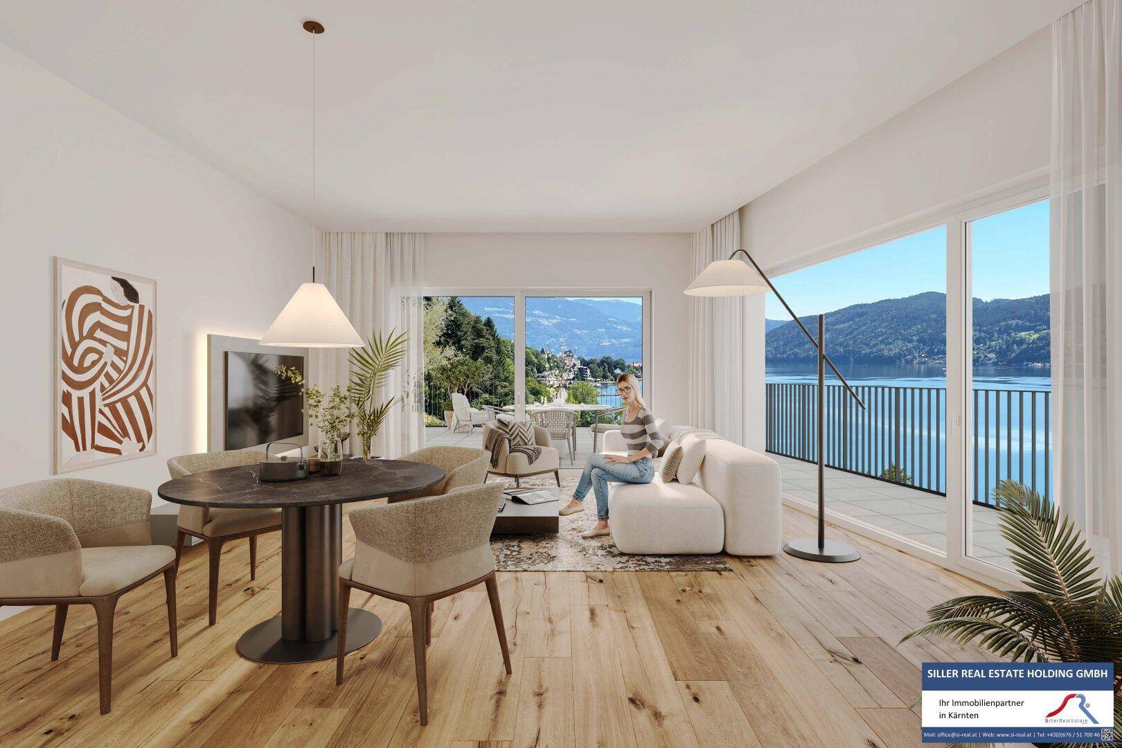 Helles Wohn- und Esszimmer mit Holzboden, großen Fenstern und Seeblick, ideal für entspannte Stunden.