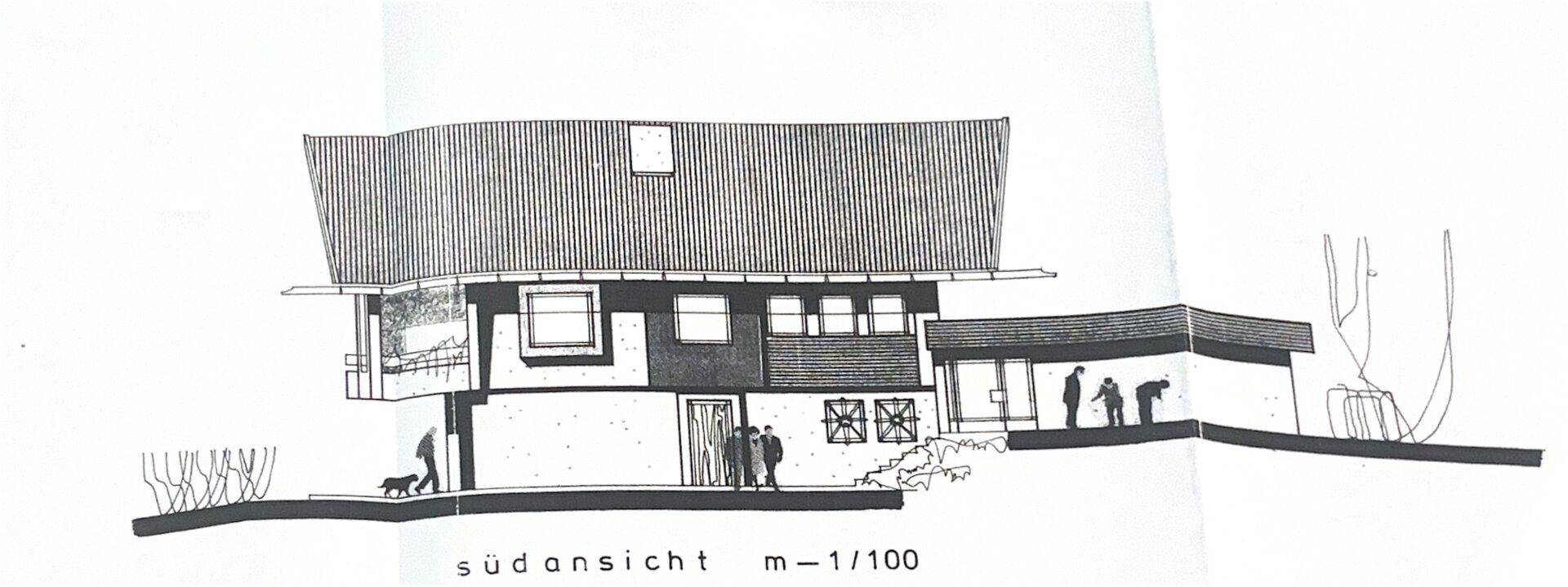 Architektonische Südansicht des Gebäudes mit markantem Dach und Fensterfronten.