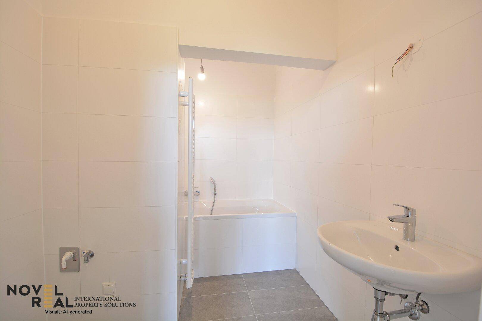 Modern gefliestes Badezimmer mit Badewanne, Duschfunktion und einem einzelnen Waschbecken.