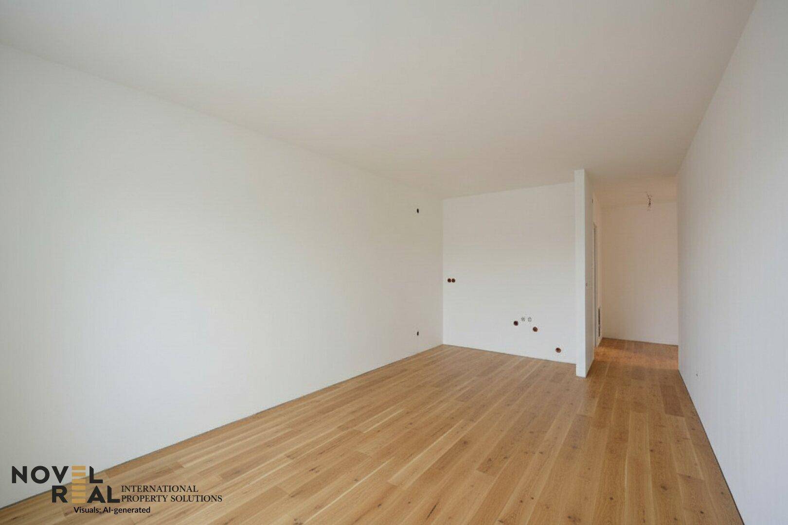 Heller, leerer Raum mit weiß gestrichenen Wänden und elegantem Holzfußboden.