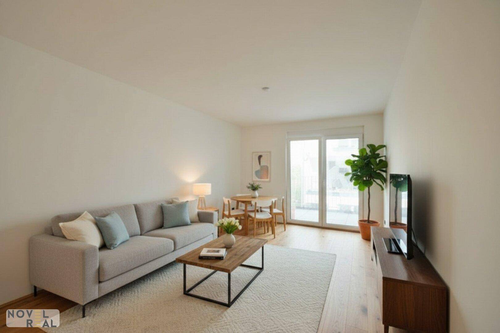Heller Wohn- und Essbereich mit Holzboden, moderner Einrichtung und Zugang zum Balkon.