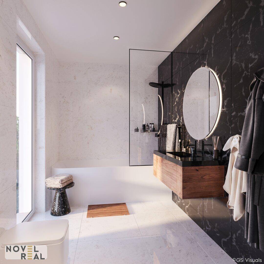Modernes Badezimmer mit schwarzen und weißen Marmorfliesen, Badewanne und begehbarer Dusche.