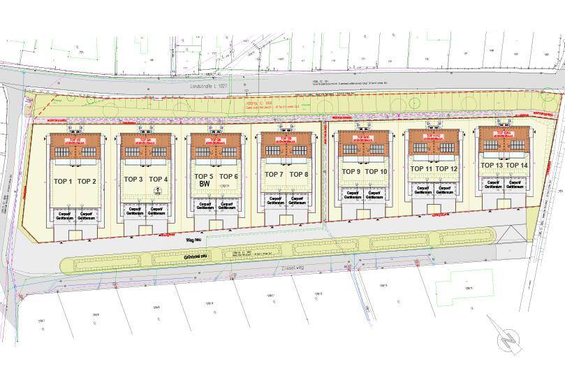 Übersichtsplan einer Siedlung mit mehreren Reihenhäusern, Carports und Grünflächen.