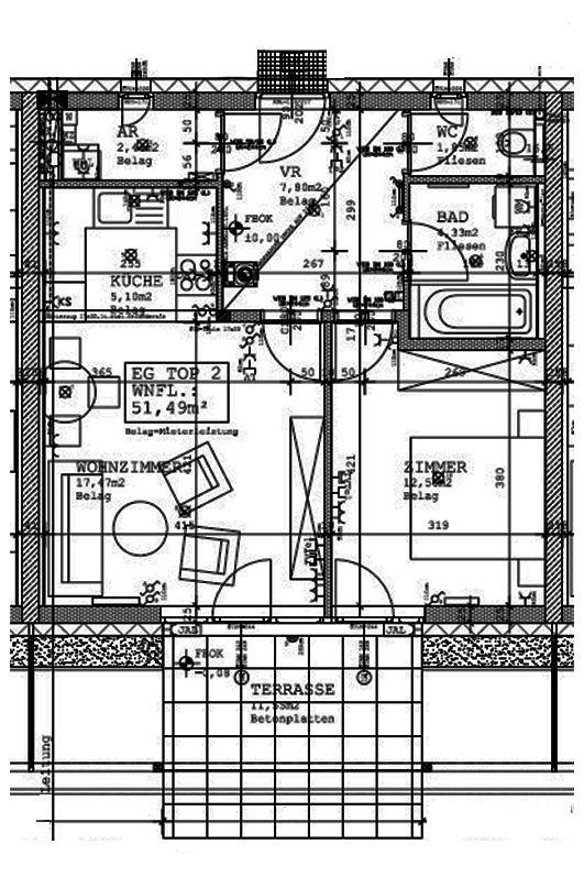 Grundriss einer Erdgeschosswohnung mit Wohnzimmer, Küche, Schlafzimmer, Bad und Terrasse.