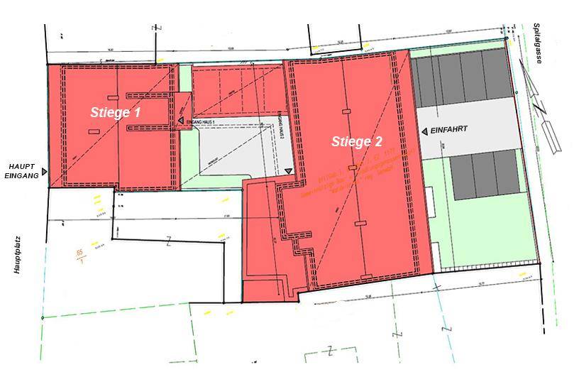 Lageplan des Anwesens mit zwei Gebäudeteilen, Haupteingang und Zufahrt zu den Parkplätzen.