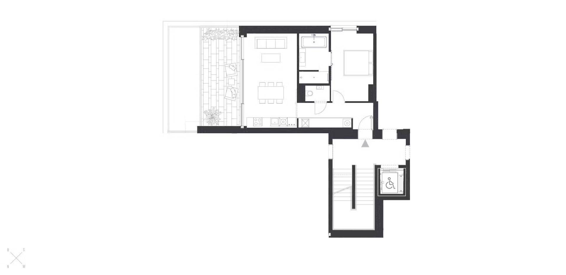Grundriss einer Wohnung mit offenem Wohnbereich, Schlafzimmer und großer Terrasse.