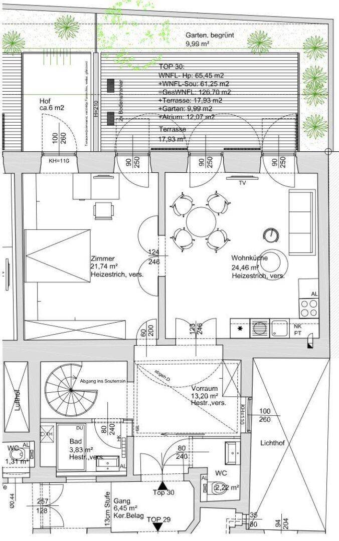 Grundriss zeigt Wohnküche, Schlafzimmer, Bad, Terrasse und Gartenbereich.