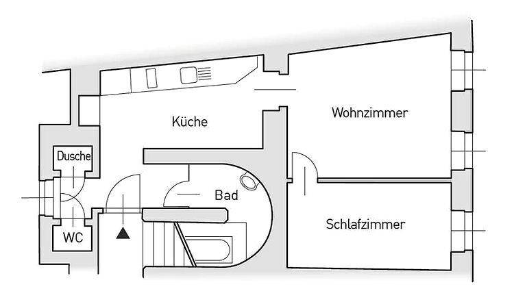 Grundriss einer Wohnung mit Küche, Wohnzimmer, Schlafzimmer, Bad und separatem WC, übersichtlich dargestellt.