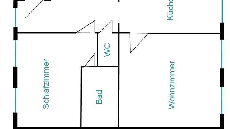 Grundriss zeigt die Aufteilung von Schlafzimmer, Bad, WC, Küche und Wohnzimmer.