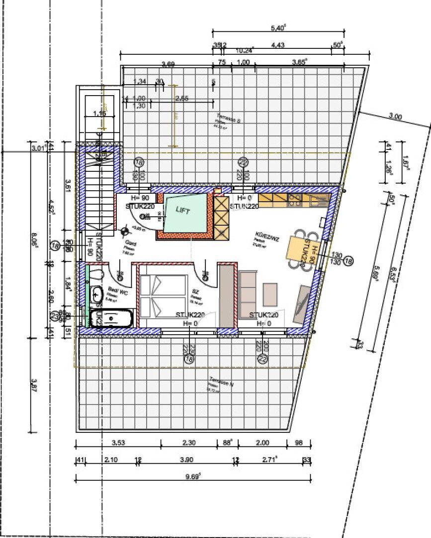 Grundriss einer Wohneinheit mit offenem Küchen- und Wohnbereich, Schlafzimmer und großer Terrasse.