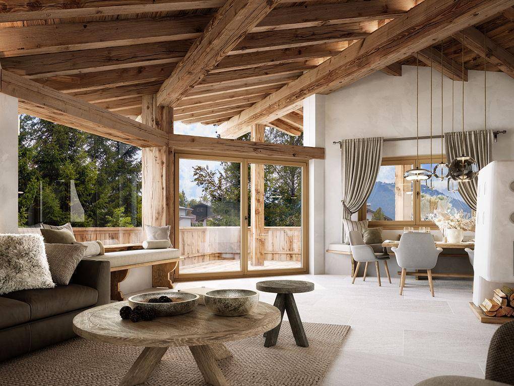 Gemütlicher Wohn-Essbereich im Chalet-Stil mit sichtbaren Holzbalken und großzügigen Fensterfronten.