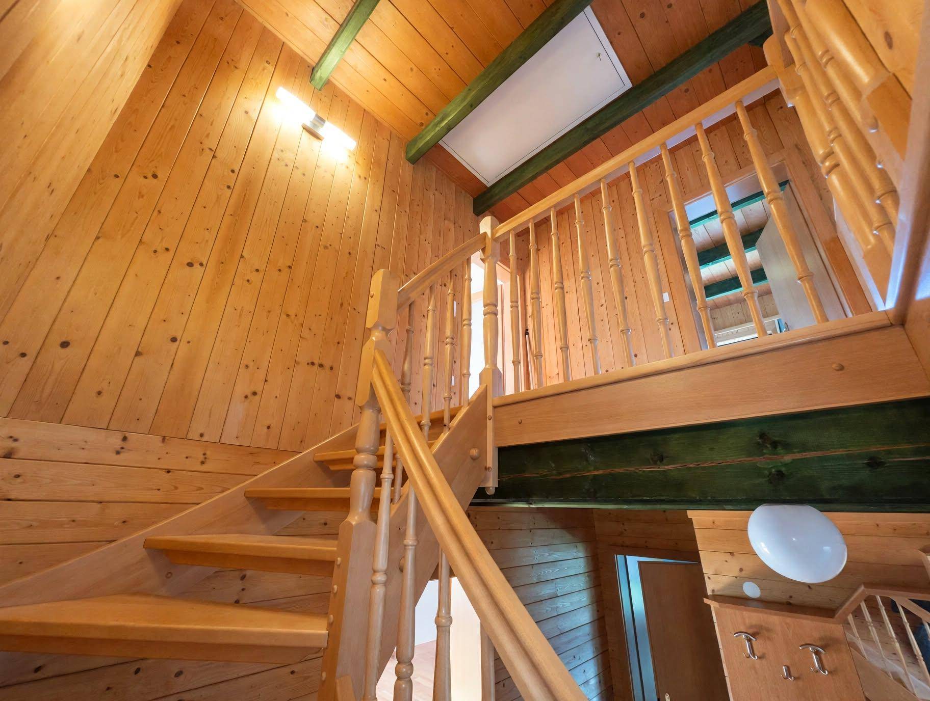 sunlit_wooden_staircase.jpg