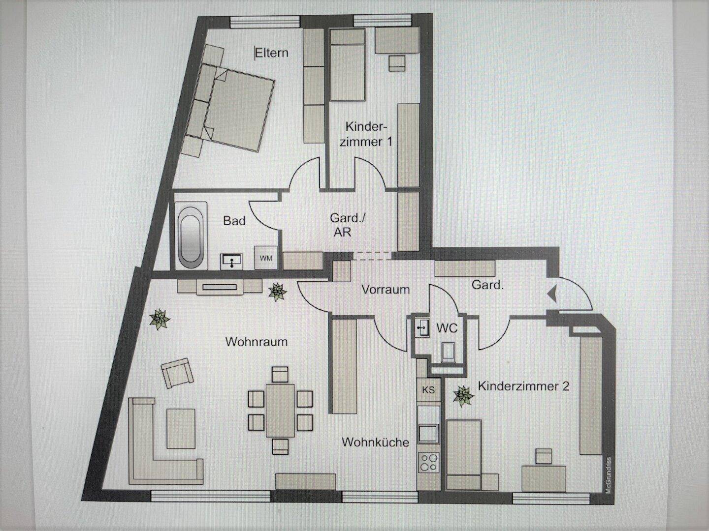 Grundriss einer Wohnung mit Wohnküche, Wohnraum, zwei Schlafzimmern und zwei Bädern.