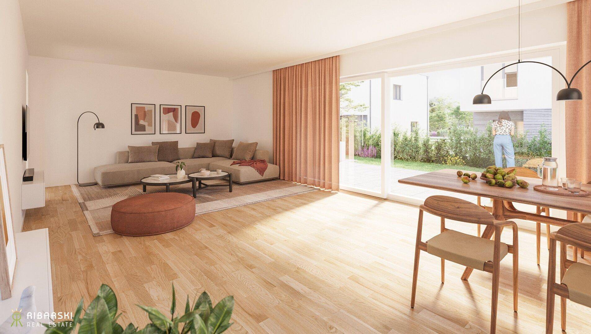 Heller, offener Wohn-Essbereich mit Holzboden, großen Fenstern und Zugang zum Garten.