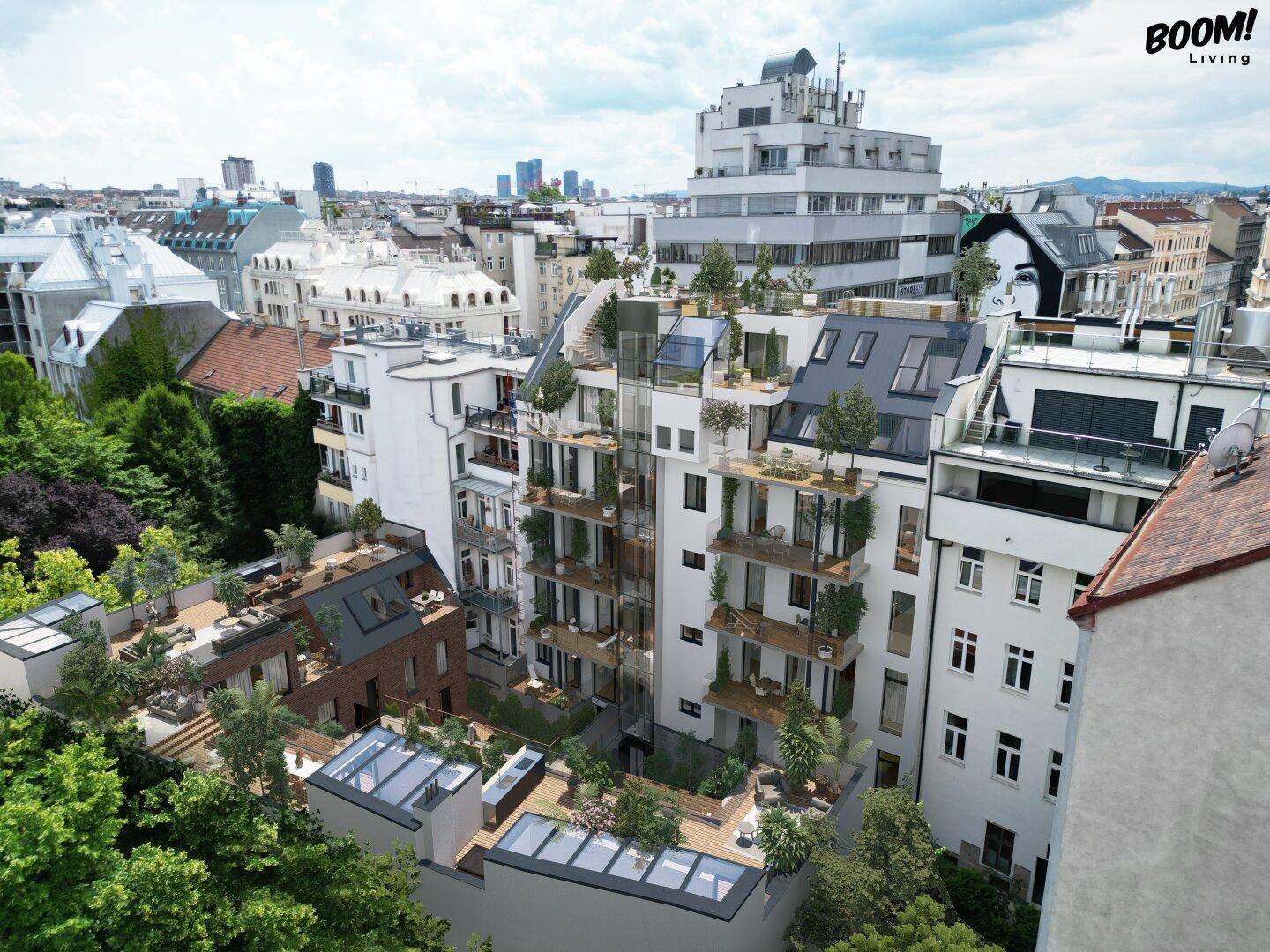 Gesamtanlage der modernen Wohngebäude mit begrünten Dächern und Terrassen in urbaner Umgebung.