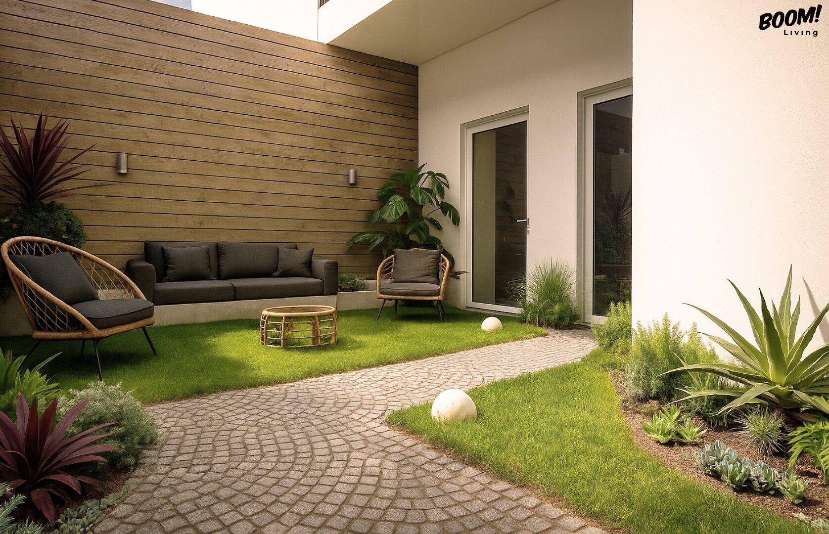 Ruhiger Gartenbereich mit Holzverkleidung, Rasen und bequemen Sitzgelegenheiten, ideal zum Entspannen.