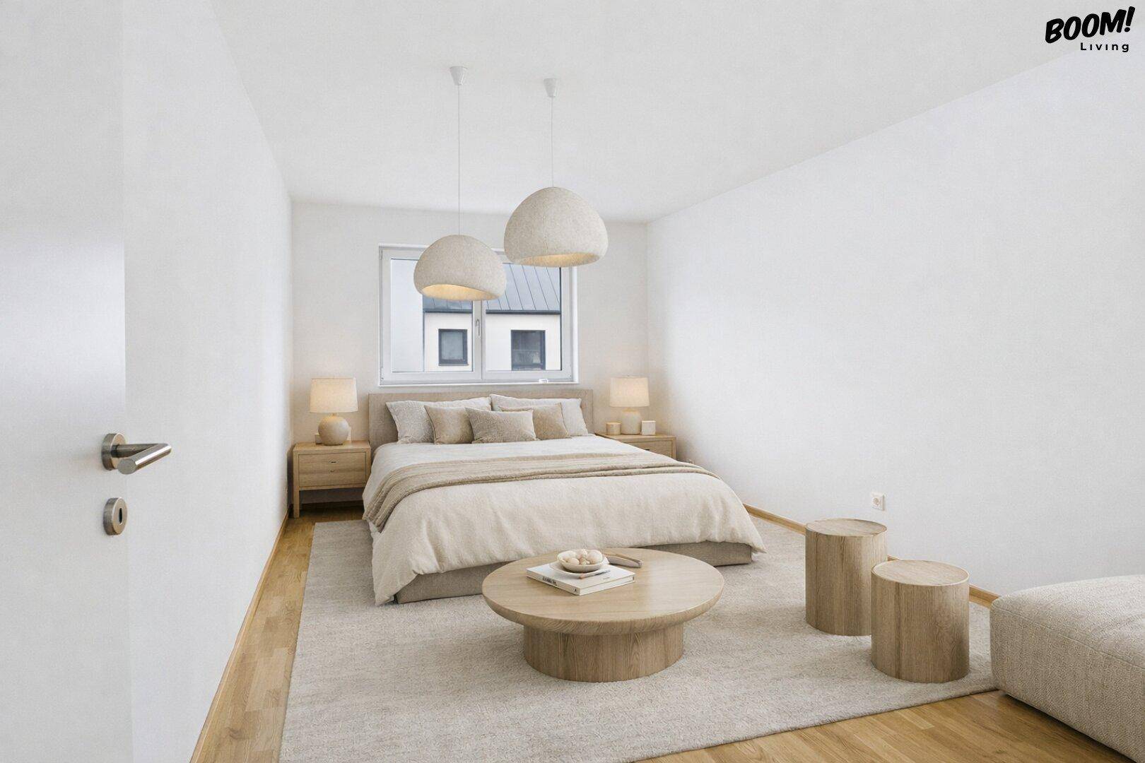 Gemütliches Schlafzimmer mit Doppelbett, Holzboden und minimalistischer Einrichtung.