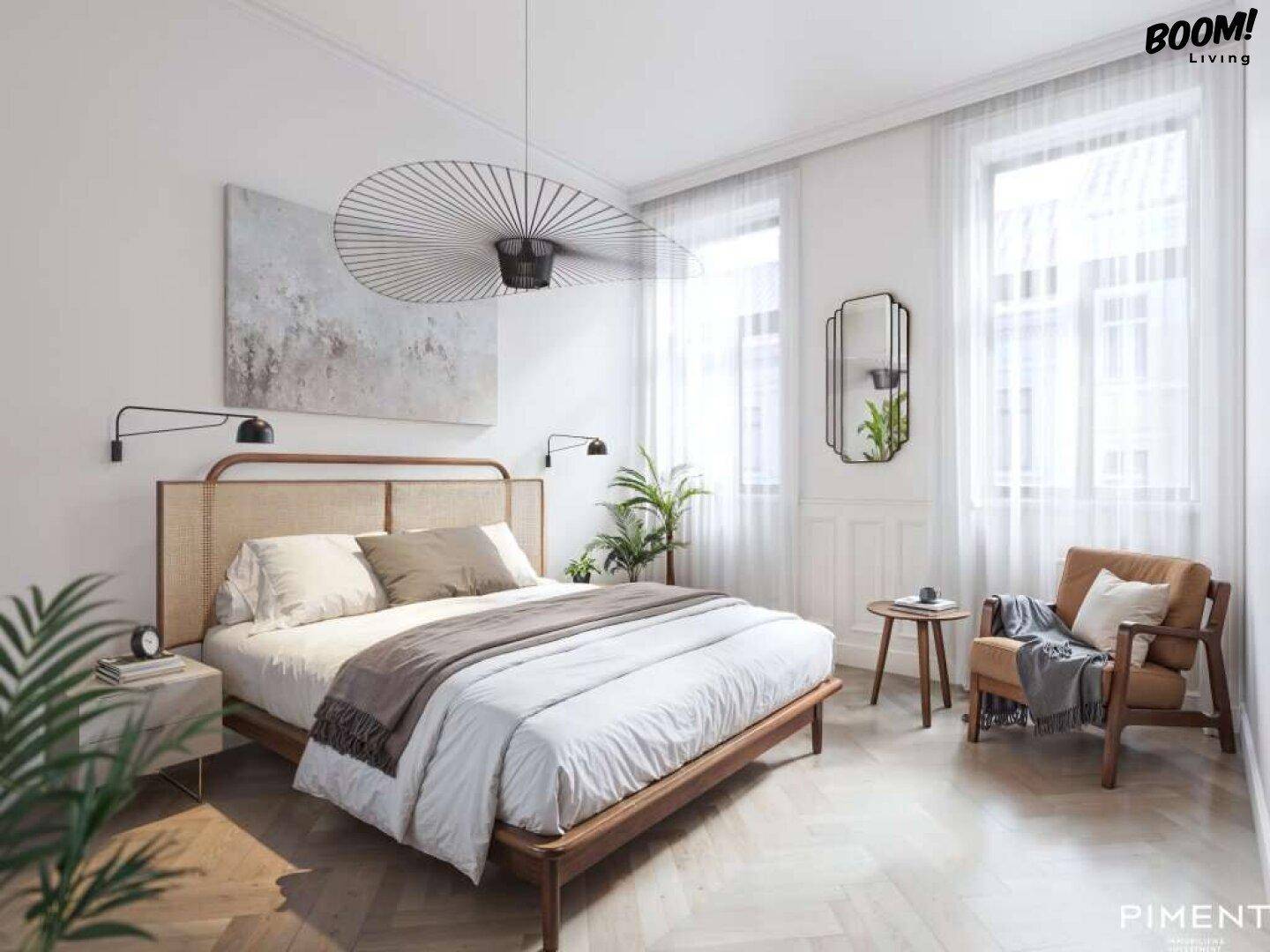 Helles Schlafzimmer mit modernem Bett, minimalistischer Einrichtung und großen Fenstern für viel Tageslicht.