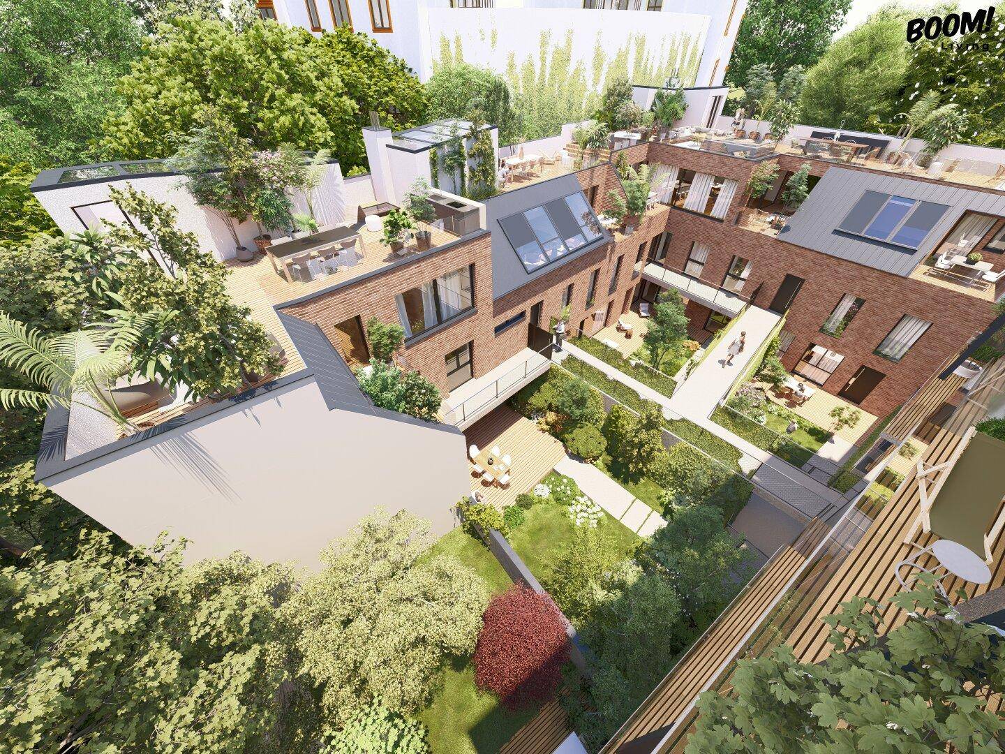 Luftaufnahme eines Wohnkomplexes mit vielfältigen begrünten Gärten und Dachterrassen.