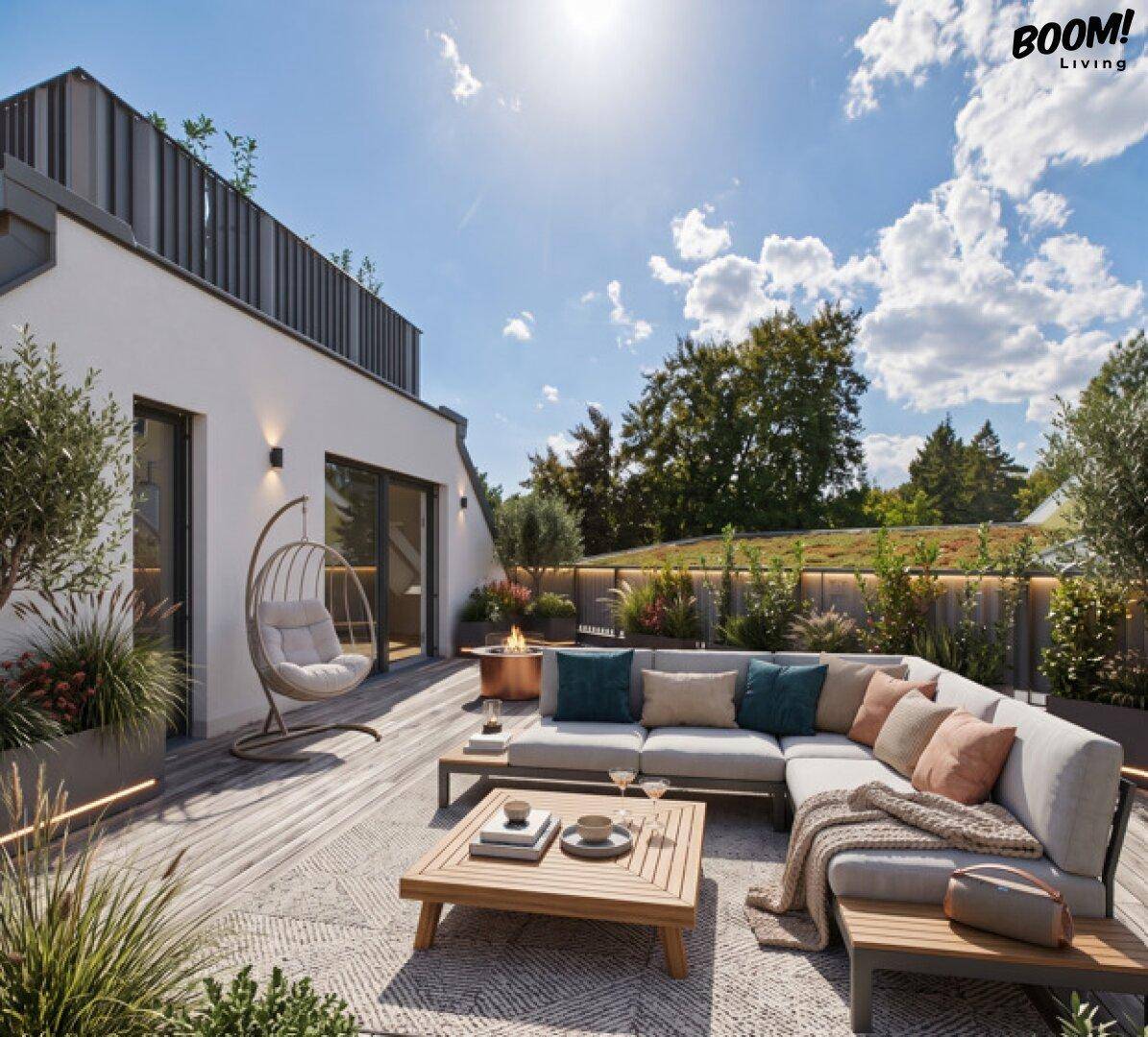 Großzügige Dachterrasse mit bequemen Lounge-Möbeln und Pflanzen für entspannte Stunden.