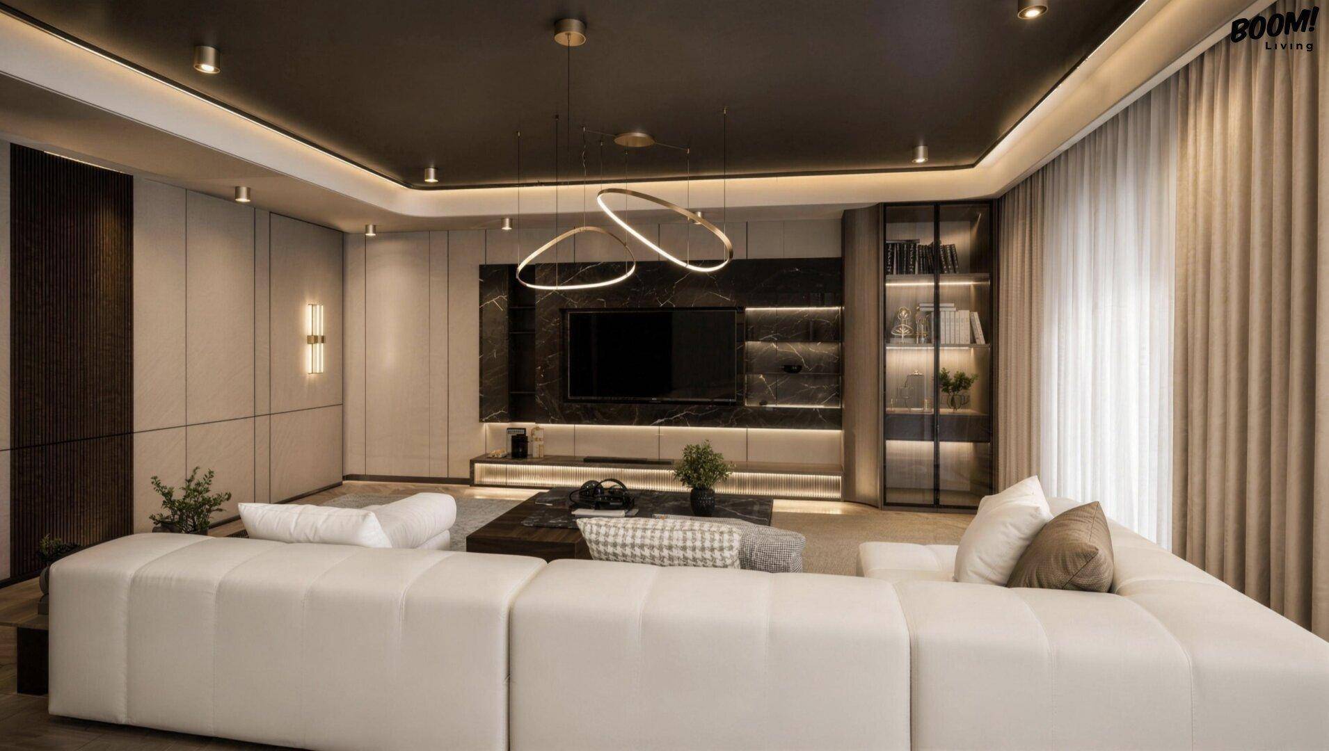 Luxuriöses Wohnzimmer mit großem weißen Sofa, dunkler Decke und eleganter Beleuchtung.