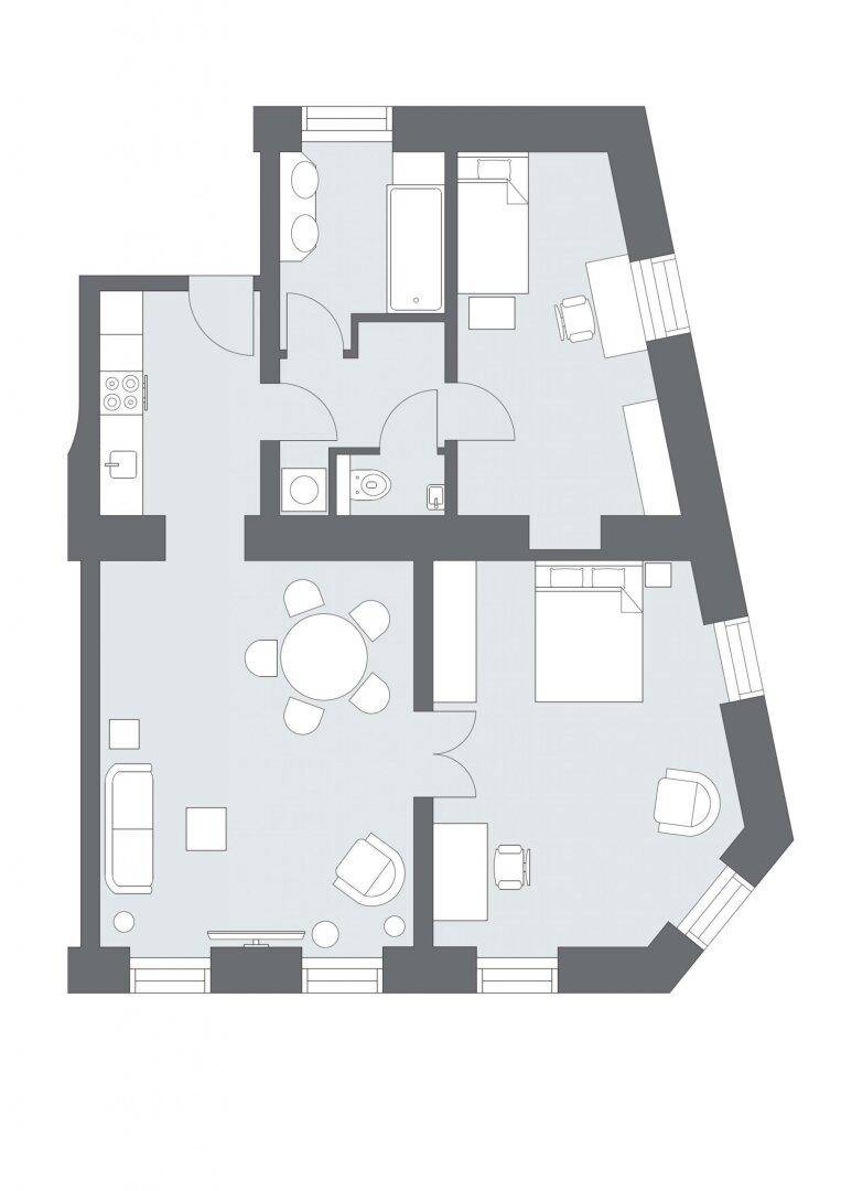 Übersichtlicher Grundriss der Wohnung mit mehreren Zimmern und offenem Wohnbereich.